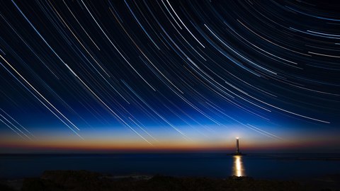 2017 04 Circumpolar trails sunset at La Hague lighthouse