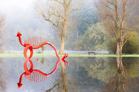 Red Dragon scuplture during River Lee flooding, October 2023